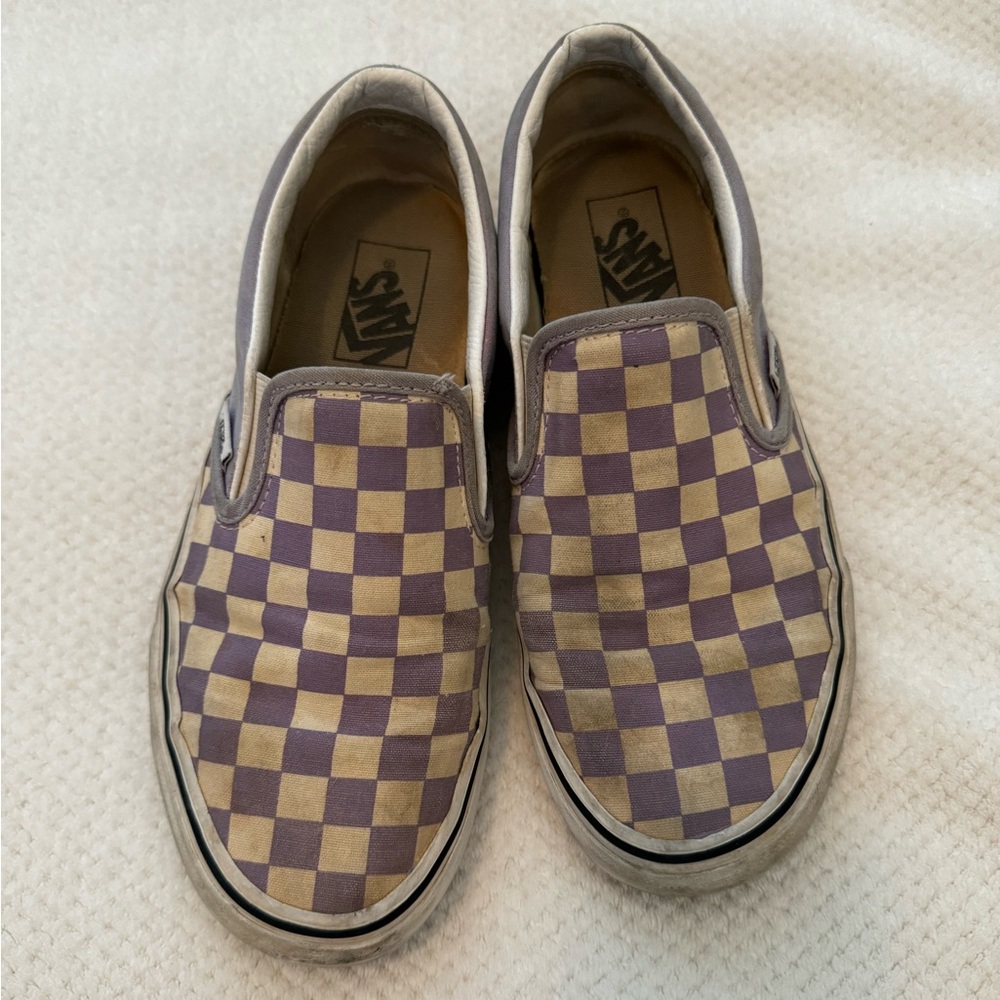 Lilac checkerboard Vans slip ons.